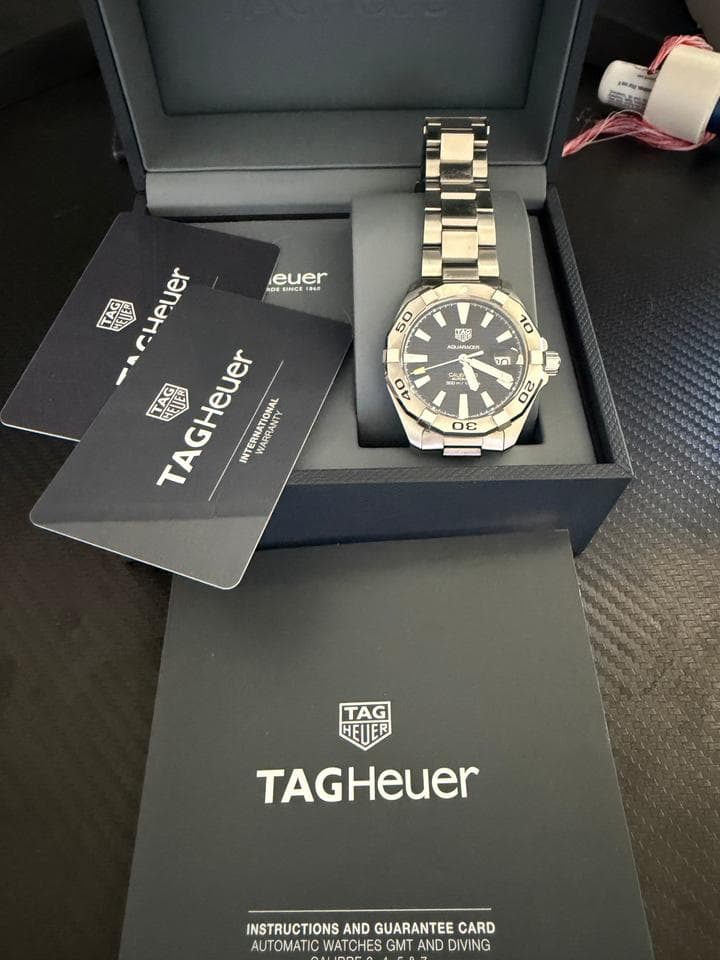 TAG Heuer Aquaracer 300MFull set box and papers. Warranty card. Very good condition