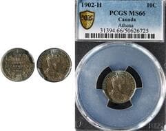 1902H 10¢ PCGS Superb Gem Mint State-66. Exhibiting vibrant green, blue, and russet toning across full, reflective...