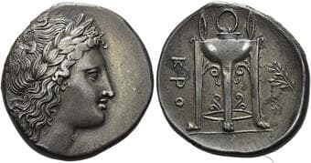 Lucania, Croton Nomos end of IV century BC, AR 20 mm, 7.2 g. Laureate head of Apollo r. Rev. KPO Tripod with high neck;...