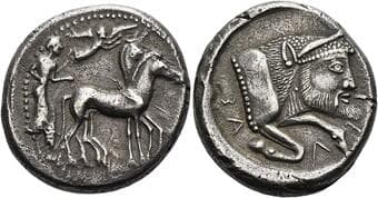 Sicily, Gela Tetradrachm circa 480-470, AR 27 mm, 17.29 g. Charioteer driving slow quadriga r., horses crowned by Nike...