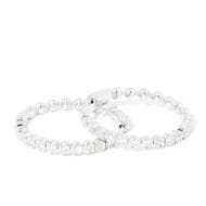 0.50 Carat Diamond Hoop Earrings in 18ct Gold One pair of 18 carat white gold hinged hoop earrings have an internal...