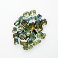 12ct Australian Sapphires Mined in Queensland, mixed cuts & colours. Estimate: 250 - 350 AUD