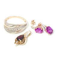 Mixed Lot of Jewellery in 9ct & 10ct Gold One 10 carat yellow gold ring with an open curving top holds grain set...