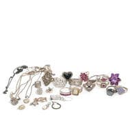 Mixed Silver & Costume Jewellery A mixed estate lot of sterling and low grade silver jewellery comprising various...