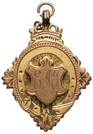 Z.V.R.C. - Rifle Club, 1904, F 9ct gold fob medal in the form of an oval with ornamentation & shield centre, size...