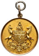 C.C.R. Annual Outing, O'Reilly Cup, 1905, EF 10ct gold fob medal, incuse circular design with dimensional coat of...