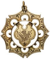 Piping Marches Z.C.S., 1913, F 9ct gold fob medal in the form of an eight-pointed star with circle and shield centre...