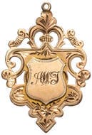 Presented by Father to A.W.T., 1915, gVF 9ct gold fob medal, ornate shield form with pierced details, size 30.5 x...
