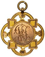T.C. T.C. Ladies Doubles, 1922, EF 9ct gold fob medal in the form of pierced quatrefoil with circle at centre...