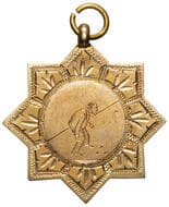 C.F.S.B.T. Lawn Bowls, 1923, gVF 9ct gold fob medal in the form of an eight-pointed star with decorative surround &...