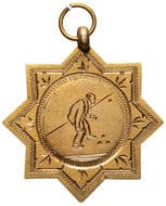 C.F.S.B.T., 1923, EF 9ct gold fob medal, eight-pointed star form w/ circle at centre w/ fig. playing lawn bowls, size...