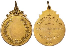N.T.P. & C.B.C. Best Canary, 1929, aEF 9ct gold fob medal, circular form with inset laurel wreath, size 25mm diam,...