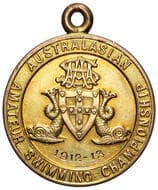 Australasian Amateur Swimming Championship, 1912 - 13, EF 9ct gold fob medal, circular design with incuse field and...