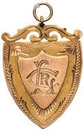 L.R.C. (Rifle Club), 1923-24, aEF 9ct gold fob medal, ornate double shield form, engraved centre LRC, size 24 x...