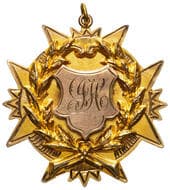 J.J.H., C. 1900S, EF 9ct gold fob medal in the form of a eight-pointed star with laurel wreath and shield at centre...