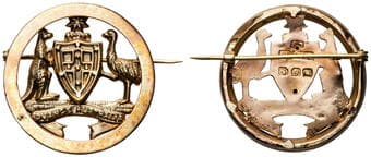 Advance Australia, aEF 9ct gold medal, circular form with inset Coat of Arms open design, ADVANCE AUSTRALIA on...