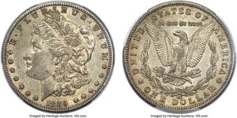 Morgan Dollars 1889-CC $1 AU50 PCGS. CAC. VAM-4. Cool frosted gunmetal-gray luster is complemented with light...