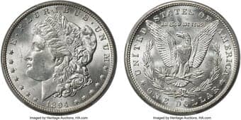 Morgan Dollars 1894-O $1 MS64 PCGS. Brilliant and soft frosting coats the surfaces, and the fields are clean. The usual...