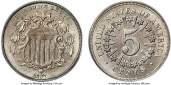 Shield Nickels 1867 5C Rays MS65 PCGS. CAC. The With Rays variety of the 1867 nickel issue is far scarcer than its No...