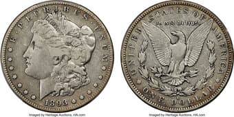 Morgan Dollars 1893-S $1 Fine 15 PCGS. VAM-2. Light silver adorns this piece with golden toning along the rims. The...