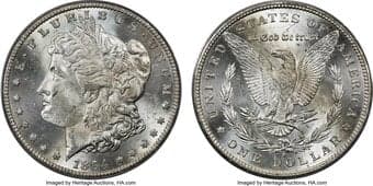 Morgan Dollars 1894-S $1 MS63 PCGS. Lightly frosted silver adorns this coin while a streak of golden patina runs...