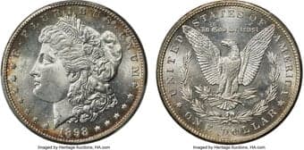 Morgan Dollars 1898-S $1 MS66 PCGS. Hints of russet-brown adorn otherwise untoned surfaces that are deeply infused with...