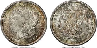 Morgan Dollars 1921-D $1 MS66+ PCGS. CAC. This coin is an exquisite entry in the category of beautifully toned and...