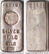 Ingots EGO Silver Bar. 1 Kilo, 999.0 Fine. S 40191. Issuer is Emirates Gold. www.HA.com/TexasAuctioneerLicenseNotice ...