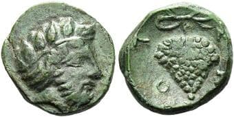 Thessaly, Scotussa Chalkous early mid IV century BC, Æ 12 mm, 1.26 g. Head of wreathed and bearded Dionysos r. Rev....