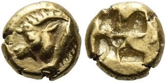 Mysia, Cyzicus 1/12 stater circa 550-500, EL 8 mm, 1.34 g. Head of ibex l.; behind, tunny fish. Rev. Quadripartite...
