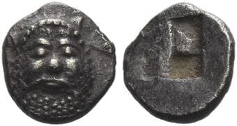 Lesbos, Methymna Hemiobol circa 500-460, AR 6 mm, 0.24 g. Head of Silenus facing. Rev. Quadripartite incuse square....