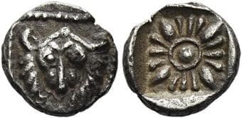Ionia, Miletus Fraction circa 420-380, AR 9 mm, 0.61 g. Head of lion facing, within dotted square. Rev. Stellate...