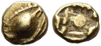 Ionia, Uncertain mint 1/96 stater circa 600-550, AV 4 mm, 0.29 g. Eye seen from front. Rev. Incuse punch with geometric...