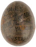 Cole's Book Arcade, Tin Egg, C. Late 1800S - Early 1900S, F Tin egg, approximately 52 x 35mm, with ornate lettering...